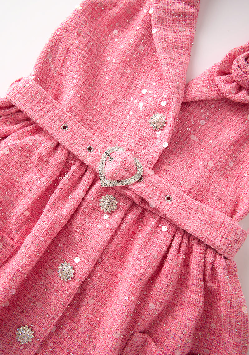 pink jingle dress This beautiful pink dress is made of pre-washed satin and lined with cotton muslin. The unique appliqu designs are crafted using sequin, satin, and spandex materials. The dress features an 18-inch all-purpose